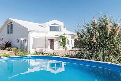 Image de Magnifique villa à distance de marche de la plage