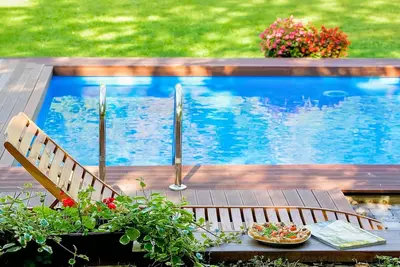 Image de Maison de vacances privée avec Wifi, bain à remous, piscine privée, climatisation, Tv, patio