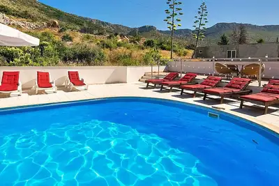 Image de Joli appartement avec climatisation, Wifi, piscine, Tv, terrasse et animaux admis