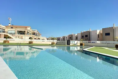 Image de rez-de-chaussée, piscine commune, wifi gratuit, parking gratuit
