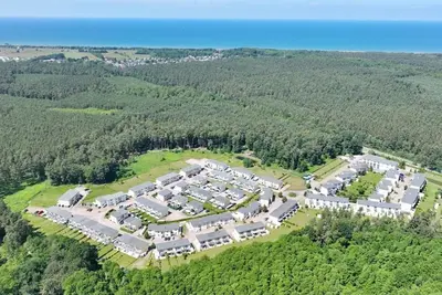 Image de Combi 2 pièces avec terrasse - * Appartement forêt côtière Federmausweg Ec
