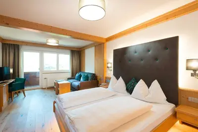 Image de Rauriser Urquellzimmer orienté plein sud avec salle de bain ferm��e - Hotel Alpina ****