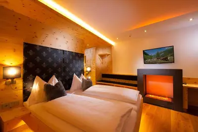 Image de Chambre Deluxe Stone Pine - Hotel Alpina ****