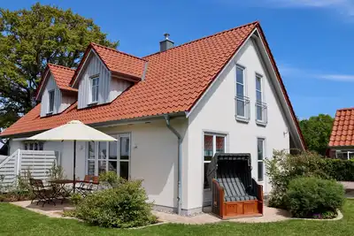 Image de Maison jumelée moderne \"Seestern\" près de la plage, cheminée, sauna, WiFi gratuit