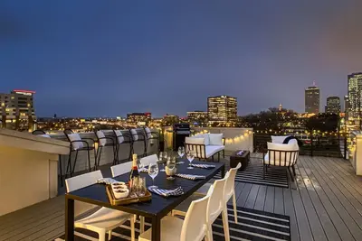 Image de Maison haut de gamme 5 * avec vue sur la terrasse du toit du centre-ville