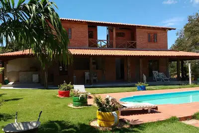 Image de Maison / Suites / Chácara Meaípe avec piscine