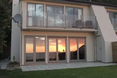 Image de Beach front unitaire de 3 chambres avec vue imprenable