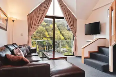 Image de Appartement bien équipé avec mezzanine, balcon et vue panoramique