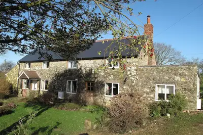 Image de Cottage situé dans la campagne vallonnée