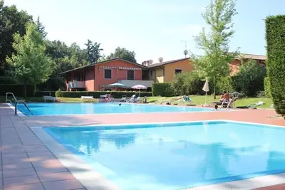 Image de Lac de Garde – charmant appartement avec piscine privée, place parking réservée