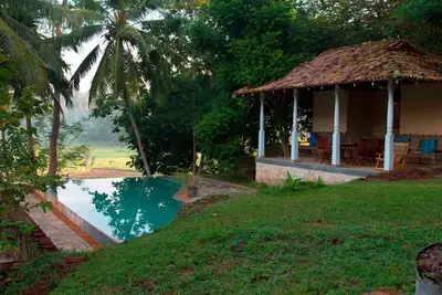Image de Villa Stone Well Garden - Villa de 3 chambres avec piscine à débordement parmi les rizières
