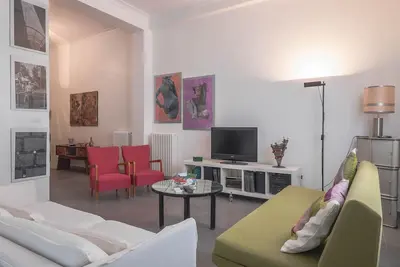 Image de Casa Rosa centrale, 95 m² wi-fi 10 minutes à pied du train de/vers l’aéroporto