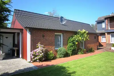 Image de Maison de vacances confortable pour jusqu'à 4 personnes à Neßmersiel sur la côte de la mer du Nord
