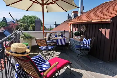 Image de Homely confortable 2 pièces Whng. (50m²) terrasse, sur le toit, avec vue sur l'eau. Île Lindau 2 pers