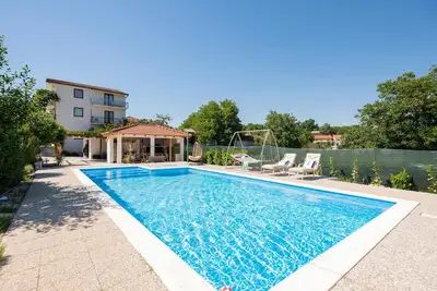 Image de Maison de 6 chambres acceptant les.