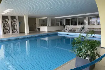 Image de Appartement confortable et ensoleillé avec piscine, sauna et connexion Wi-Fi