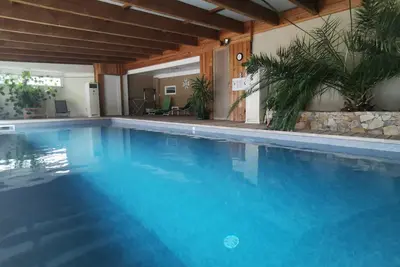 Image de Gîte avec piscine privée et chauffée à 30 °C toute l'année, à 15 min de l'Alsace