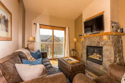 Image de Penthouse avec vue partielle sur la pente, très grand lit, près de la télécabine, Wifi gratuit