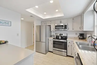 Image de Condo en bord de mer avec vue fabuleuse sur l'océan - 2 chambres / 2 salles de bain