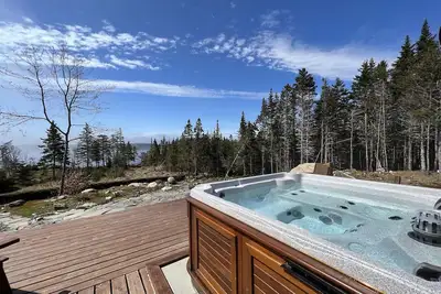 Image de Luxueux Lakeside Cottage Bear (mobilier design / au bord du lac / wifi / belltv)