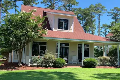 Image de Le Cottage Cala Lily: Maison de plage de luxe avec front de verrière