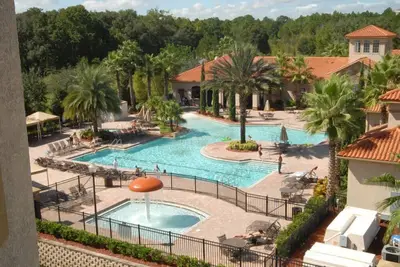 Image de Condo magnifique dans prestigieux Championsgate Golf Resort Communauté w Vue de la piscine