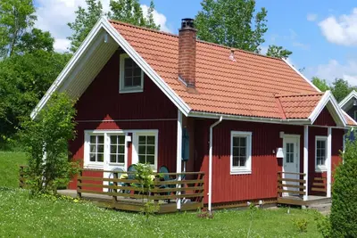 Image de Confortable maison avec sauna et jacuzzi en bord de lac