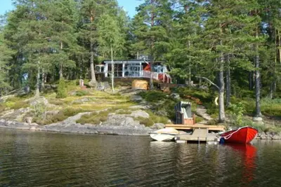 Image de Maison de vacances OPPBJÄRKEN, parcelle lac, bain à remous, ponton Incl. bateau à moteur