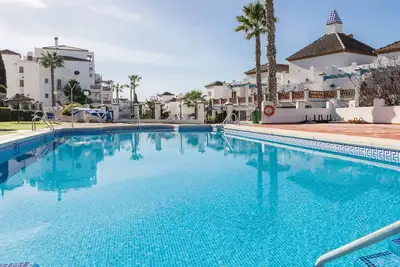 Image de Penthouse de luxe Mijas golf, joliment décoré avec vue sur la montagne.