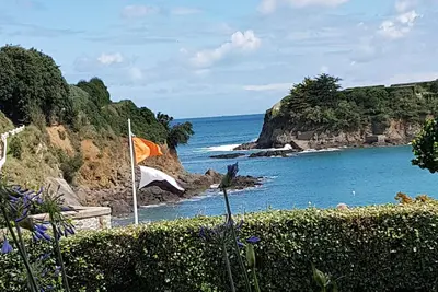 Beach Of The Countess. Classified As A Remarkable Site. A Flower Garden