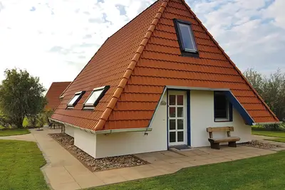Image de Maison confortable de niveau 4 étoiles directement sur la digue de la mer du Nord, conviviale et familiale