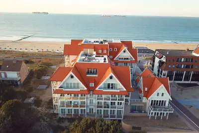 Image de Belle maison de plage familiale sur les dunes avec piscine