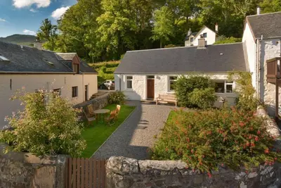 Image de Coachmans Cottage - un charmant cottage avec jardin clos