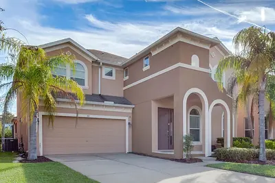 Image de 6 chambres 5. 5 salles de bain avec piscine et spa près de Disney