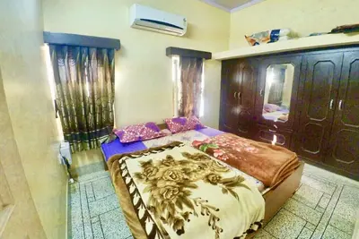 Image de Luxueuse maison de 2 chambres avec cuisine et salon