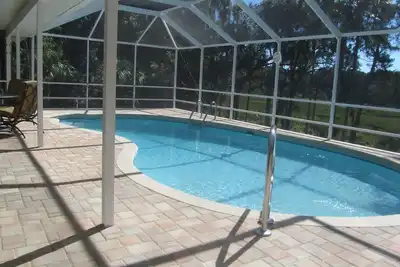 Image de Spectaculaire maison au bord de l'eau! ! W / piscine, quai, kayaks, canoës, vélos! Rapide au Golfe