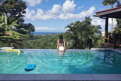 Image de Maison de vacances dans les Caraïbes avec piscine et vue sur la mer, à 10 minutes de la plage, le golf