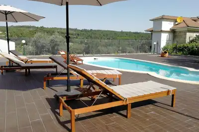 Image de Quinta do MalhĂ´ avec piscine et court de tennis