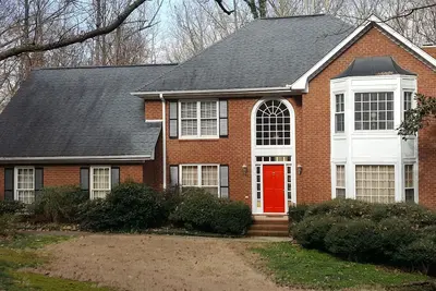 Image de Maison traditionnelle sur 2. 4 acres boisés