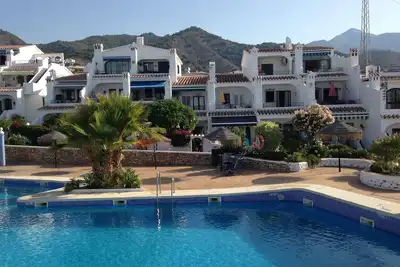 Image de Emplacement de la piscine parfaite dans le magnifique village Capistrano Ă Nerja