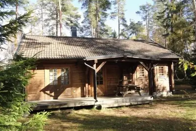 Image de Chalet en bois rond pour 4 + 2 personnes, 80m2 au milieu de la forĂŞt entre 2 lacs