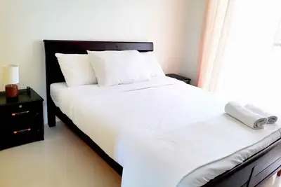 Image de End Unit Condo Ă Wind Tagaytay par R & M- City & Lake View