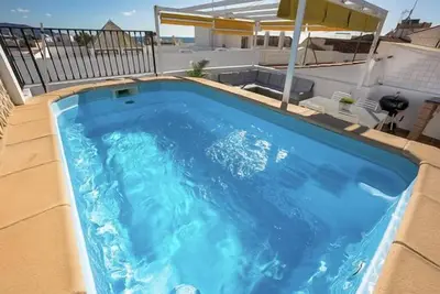 Image de Duplex avec piscine privée dans le centre de Nerja