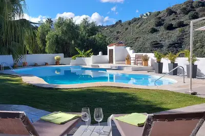Image de Joyau HarmCharming avec piscine dans les montagnes. 20min Sw de Las Palmas gelegen