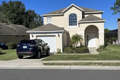 Image de Fab 4 chambres, 3 salles de bain, piscine et salle de jeux, à 25 minutes de Disney