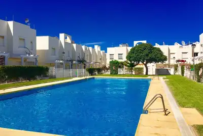 Image de Spacieux 2 chambres avec une grande piscine près de la plage et du golf