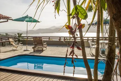Image de Maison dans une communauté fermée avec piscine et vue imprenable sur la lagune de Garopaba