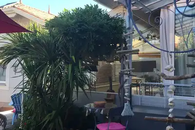 Image de Maison à Arcachon proche de la plage, décoration soignée, jardin