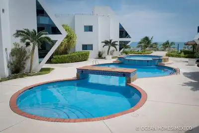 Image de Ocean / Front de mer, Condo 2 chambres, 6 couchages, piscine, idéal pour les familles