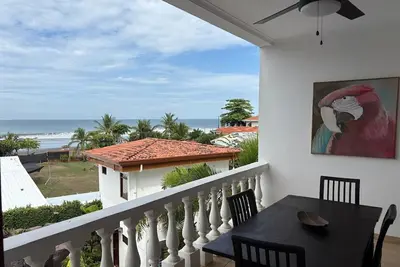 Image de Condo dans le complexe avec vue sur l'océan et accès à la piscine partagée près de la plage